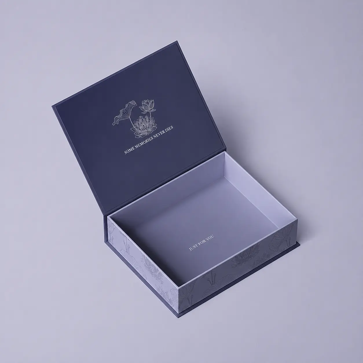 Navy book-style rigid gift box open to show the cover and inner tray