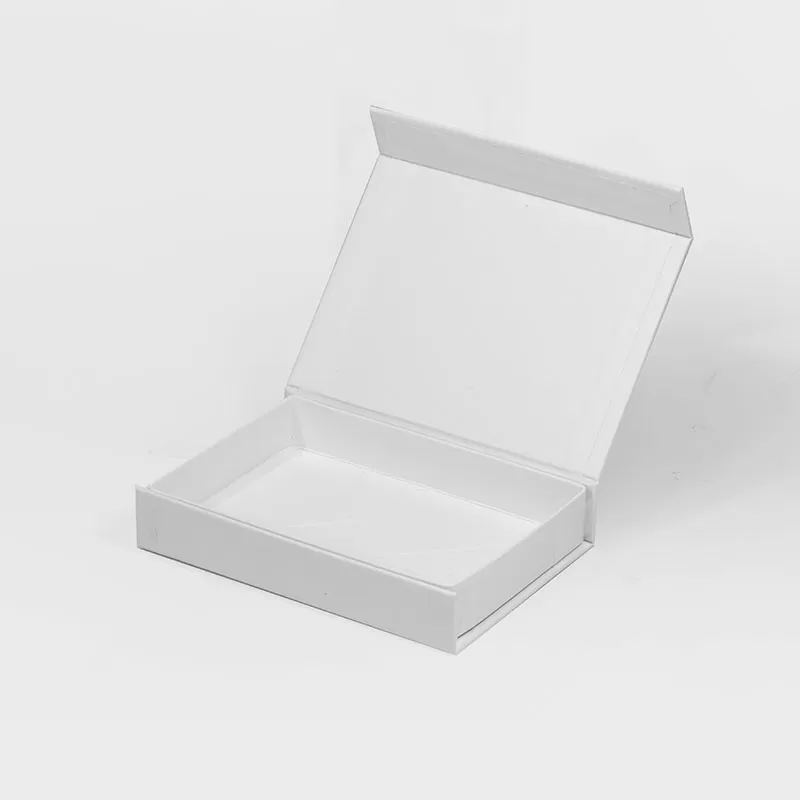 Open white magnetic gift box showing the lid and closure flap